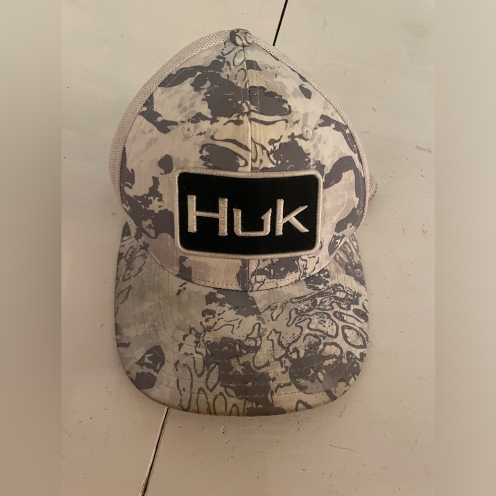 Men’s HUK hat, has a few stains but could be cleaned off